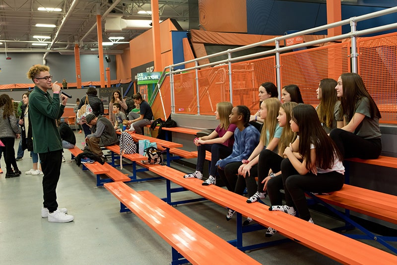 Image of kids on a field trip to Airborne Adventure Park.